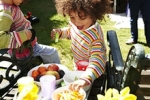 Child and snack food on a table